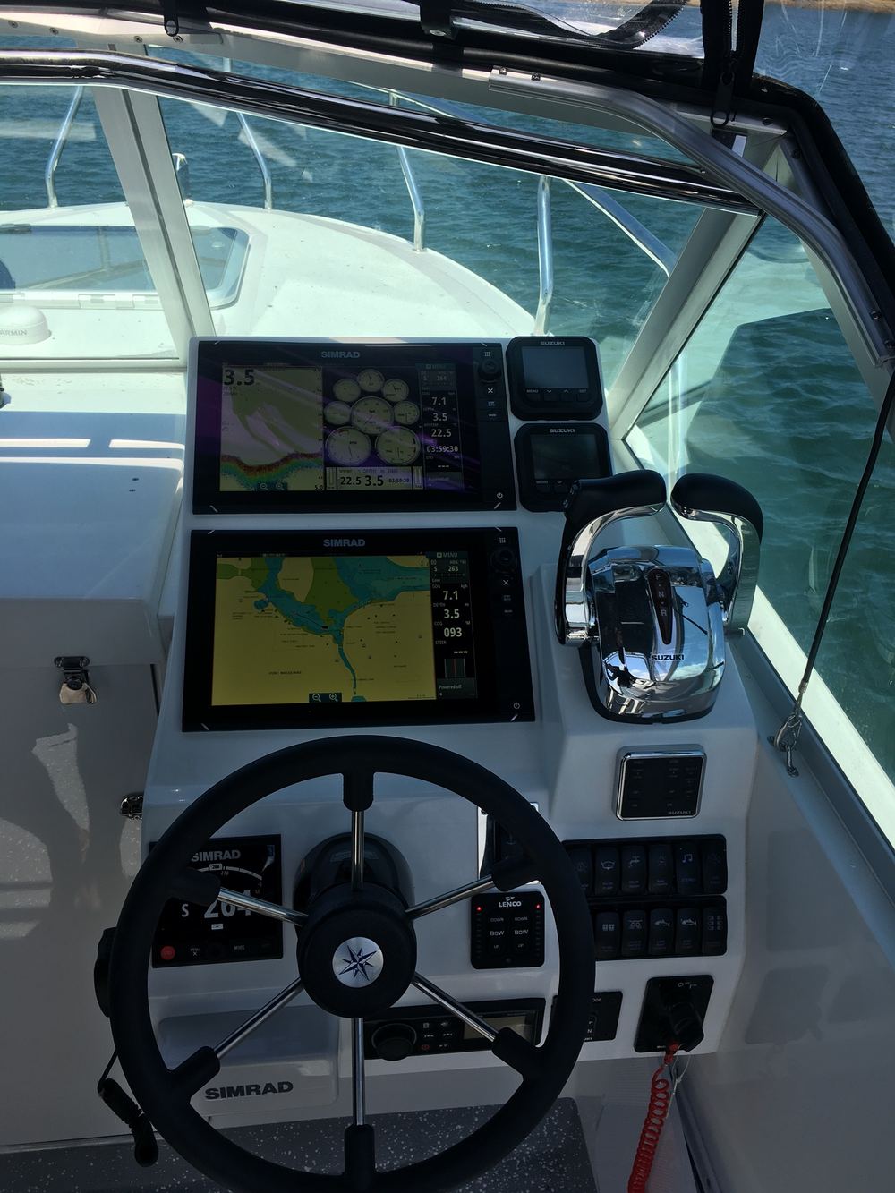 Simrad NSS evo3 multifunction displays installed at helm by Shotgun Marine Services Port Macquarie NSW